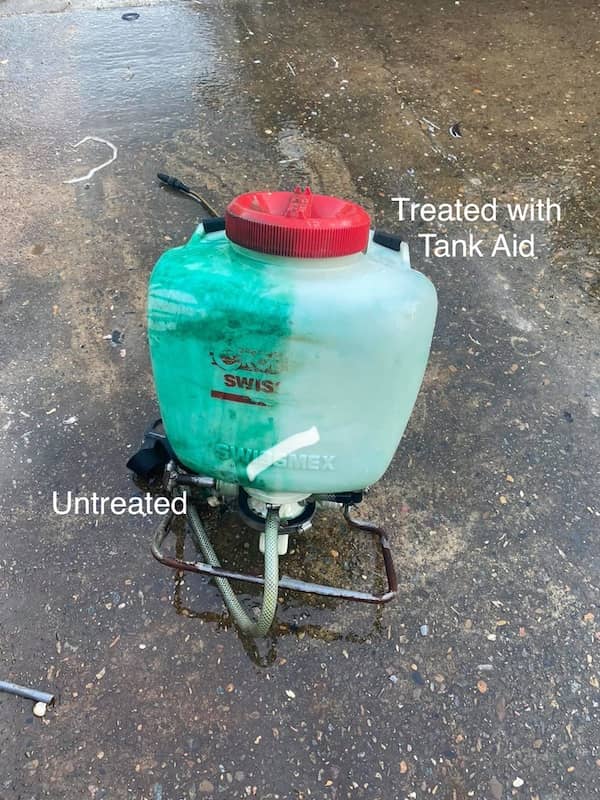 Turf pigment remover working on a stained spray tank